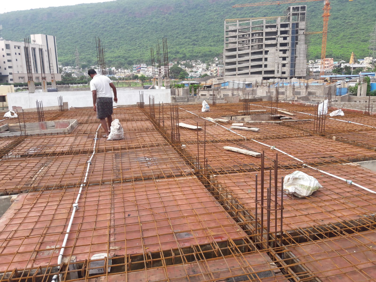 Slab reinforcement and conduit work on a multi-storey site in Visakhapatnam